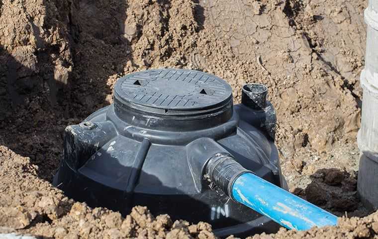 septic tank in ground dug up